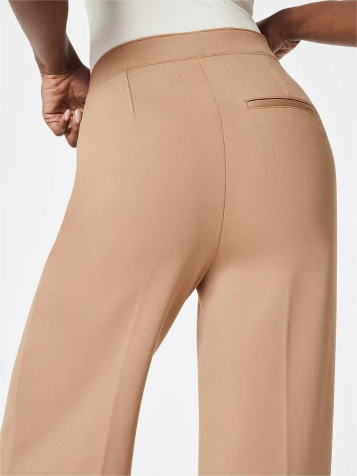 High-waisted, wide-cut trousers with hidden tummy comfort 