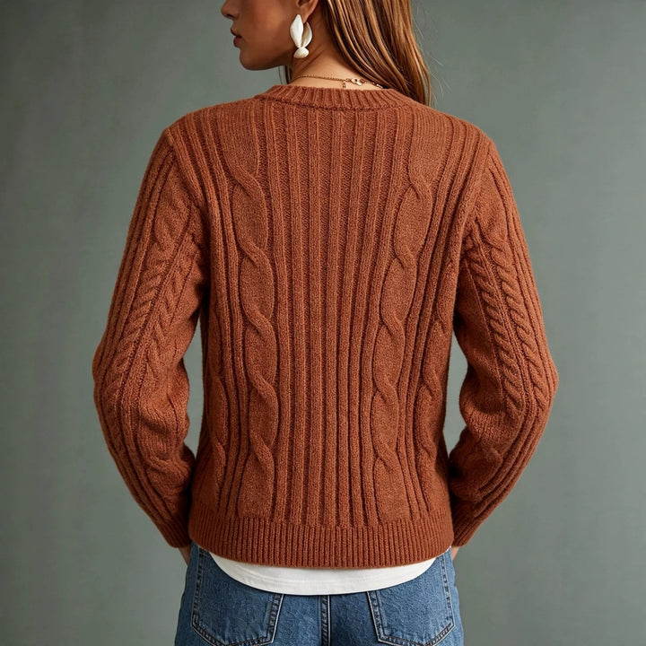 Nahaufnahme des weichen Strickmaterials mit Zopfmuster