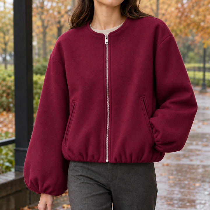 Seitliche Ansicht einer Damenjacke mit Ballonärmeln