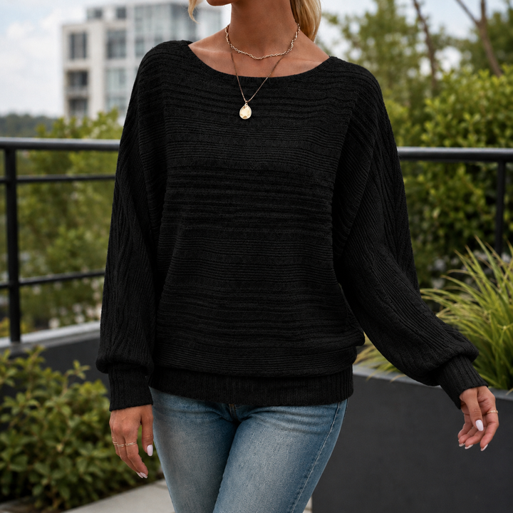 Rückansicht des Damen-Rippstrickpullovers aus geripptem Strick