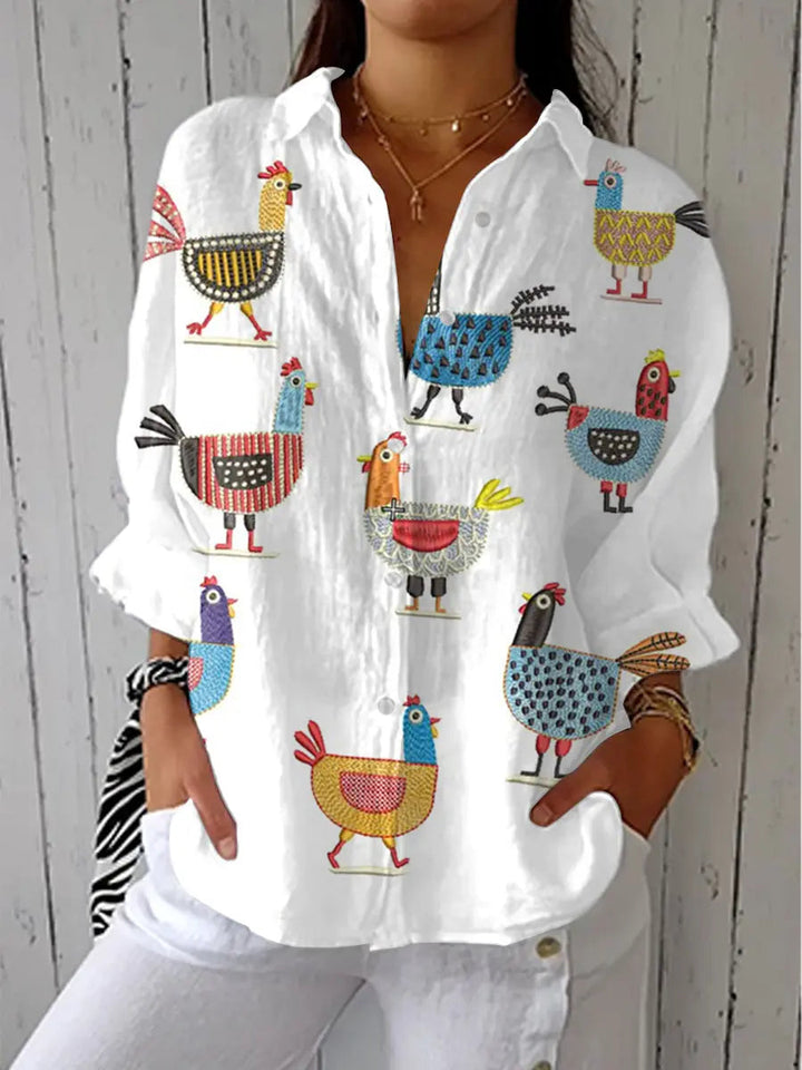 Damenbluse mit Print, V-Ausschnitt und Knopfleiste in modischem Design