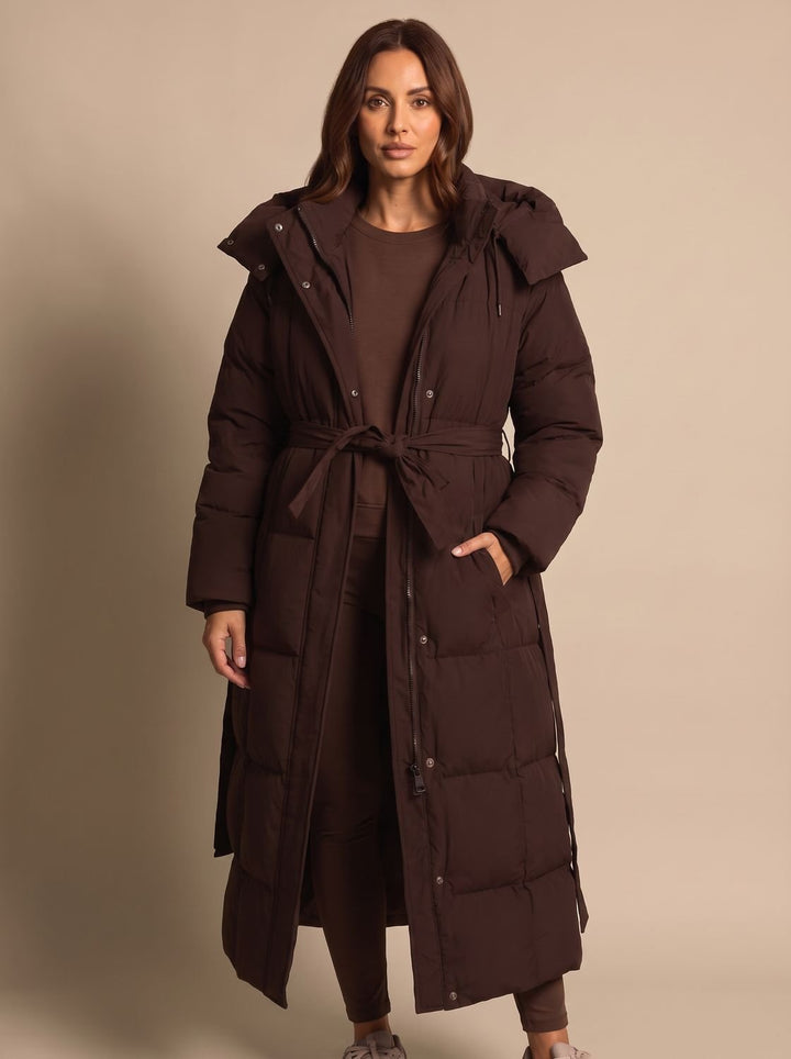 Eleganter Longline-Steppmantel für Damen mit Gürtel und wärmender Fütterung